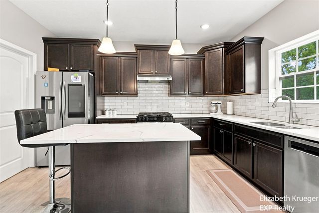743 Petoskey Stone Drive, Byron Center, MI 49315