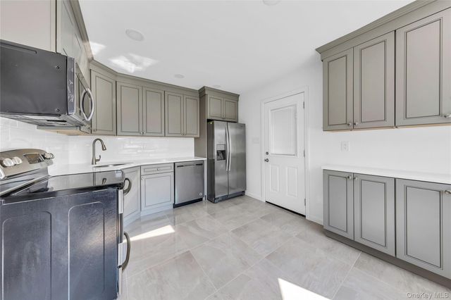 9 Academy Lane, Levittown, NY 11756