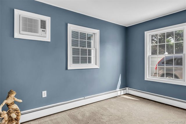 9 Academy Lane, Levittown, NY 11756