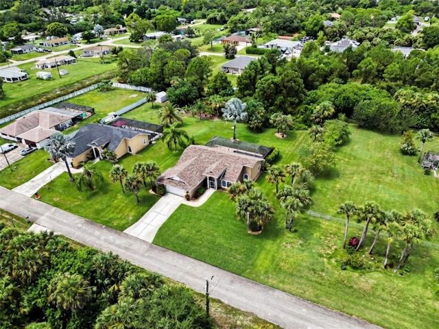 405 POINSETTIA AVENUE, Lehigh Acres, FL 33972