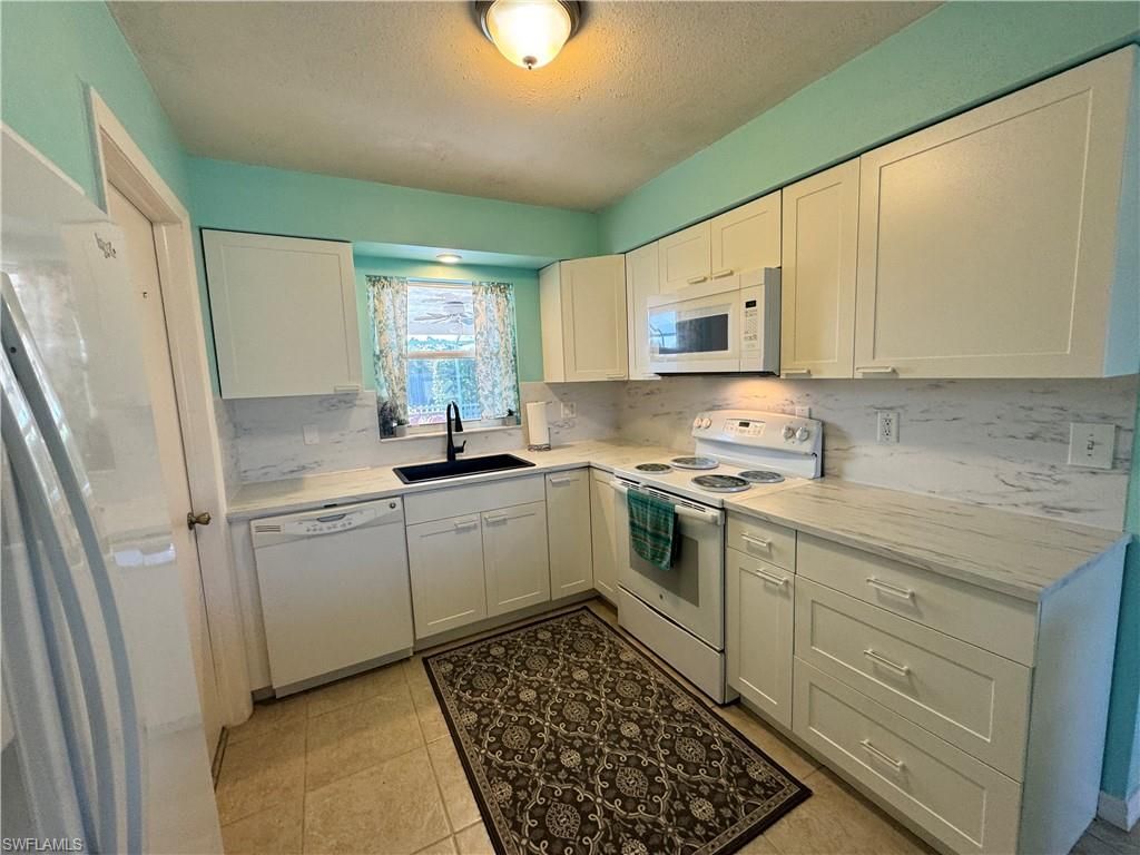 1027 SE 17th AVE, CAPE CORAL, FL 33990 — photo 4