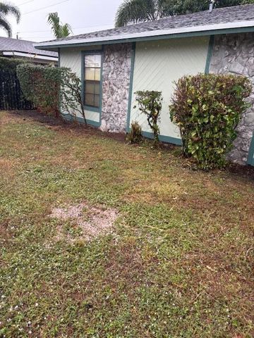 203 Canterbury Drive W, Riviera Beach, FL 33407