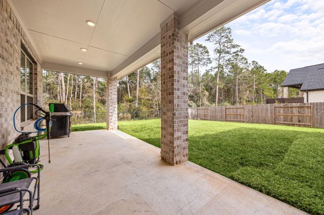 1021 Lakemont Bend Lane, Pinehurst, TX 77362