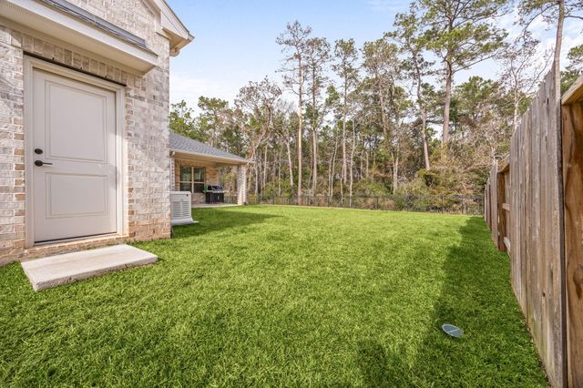 1021 Lakemont Bend Lane, Pinehurst, TX 77362