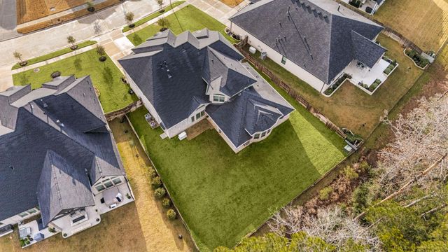 1021 Lakemont Bend Lane, Pinehurst, TX 77362