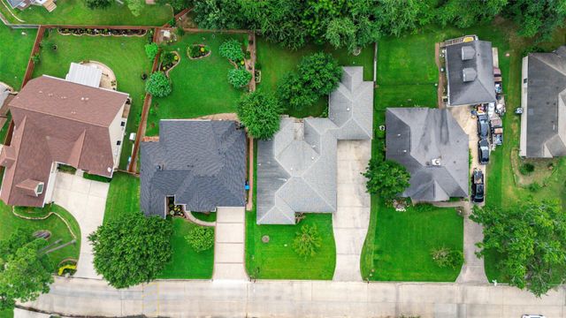 11689 Sagittarius Drive W, Willis, TX 77318