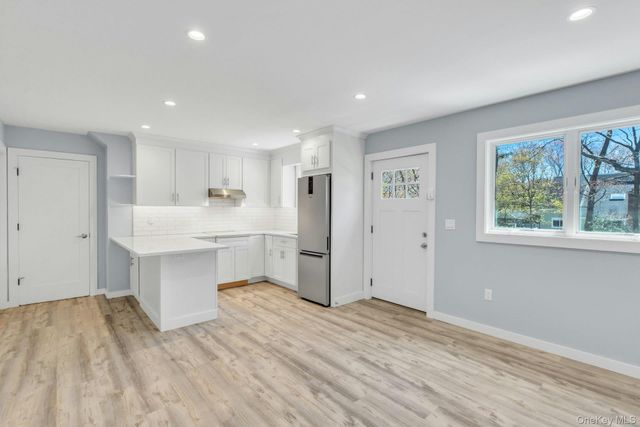 3 Quail Run, Hampton Bays, NY 11946