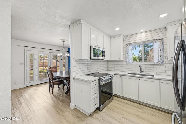 658 W PORT AU PRINCE Lane, Phoenix, AZ 85023