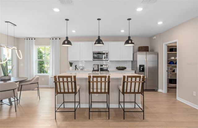 5660 SWAYING BLOSSOM ALLEY, Clermont, FL 34714