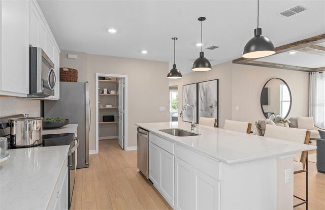 5660 SWAYING BLOSSOM ALLEY, Clermont, FL 34714