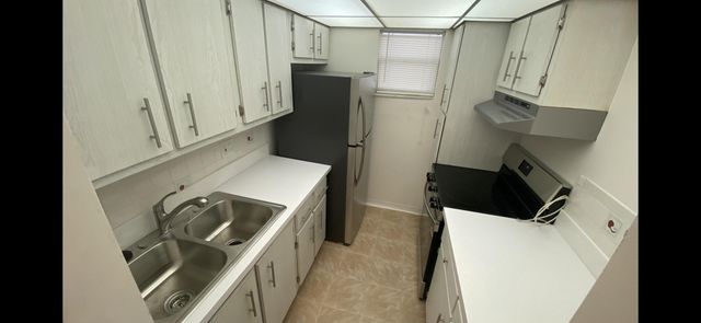 3160 HOLIDAY SPRINGS Boulevard 7-311, Margate, FL 33063