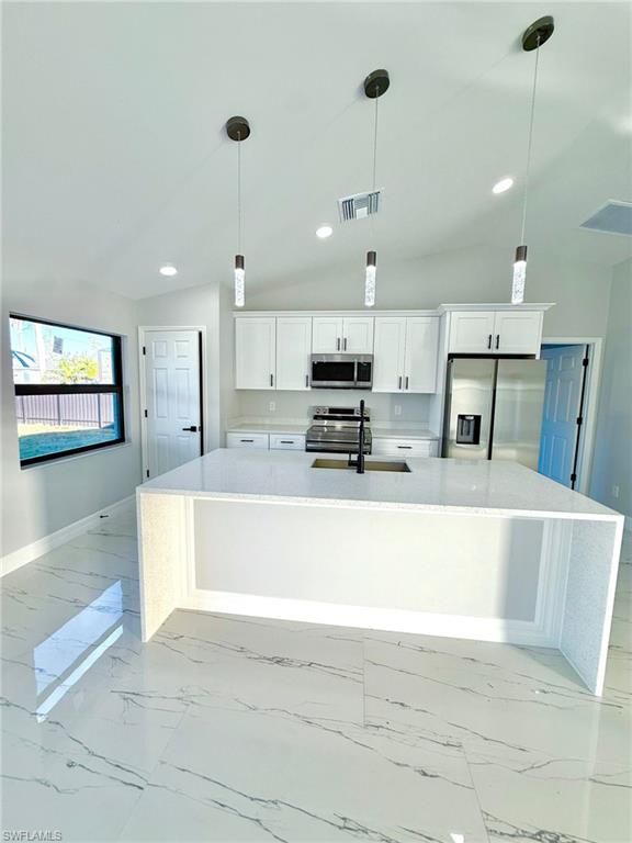 Image 8 of property listing at 2610 NW 10th TER, Cape Coral, FL 33993