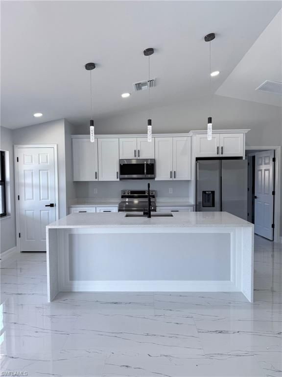 Image 9 of property listing at 2610 NW 10th TER, Cape Coral, FL 33993