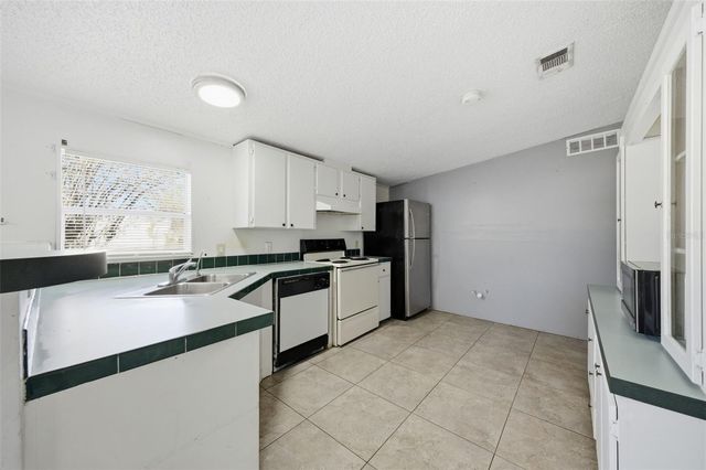 12513 WALTHAM AVENUE, Tampa, FL 33624