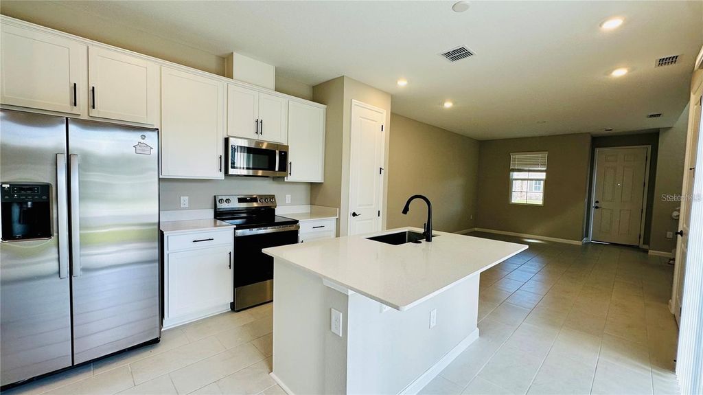 Image 2 of property listing at 1528 ERIN BREEZE LANE, Kissimmee, FL 34744