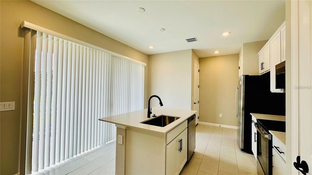 Image 4 of property listing at 1528 ERIN BREEZE LANE, Kissimmee, FL 34744