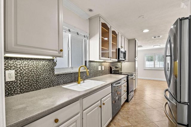 1404 Alpha Court S, Lake Clarke Shores, FL 33406