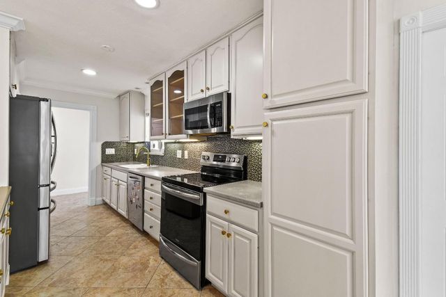 1404 Alpha Court S, Lake Clarke Shores, FL 33406