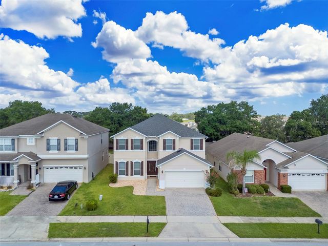 26023 MEADOW BREEZE LANE, Leesburg, FL 34748