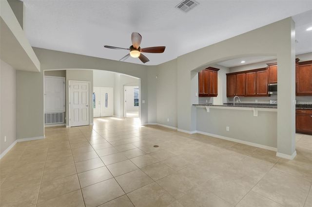26023 MEADOW BREEZE LANE, Leesburg, FL 34748