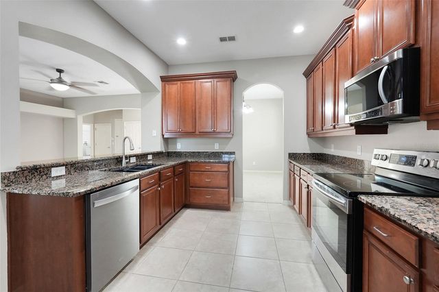 26023 MEADOW BREEZE LANE, Leesburg, FL 34748