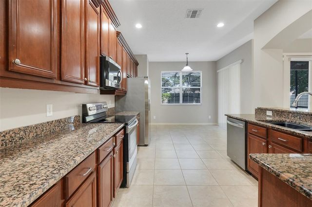 26023 MEADOW BREEZE LANE, Leesburg, FL 34748