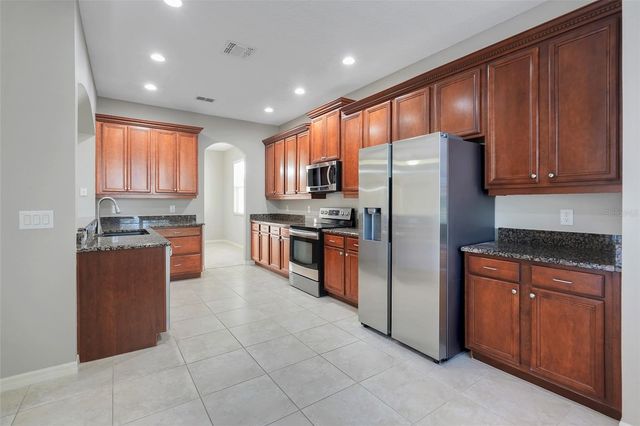 26023 MEADOW BREEZE LANE, Leesburg, FL 34748