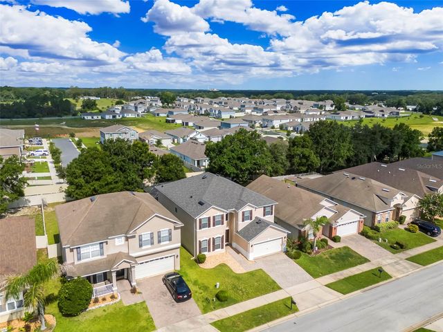 26023 MEADOW BREEZE LANE, Leesburg, FL 34748