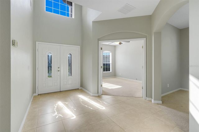 26023 MEADOW BREEZE LANE, Leesburg, FL 34748