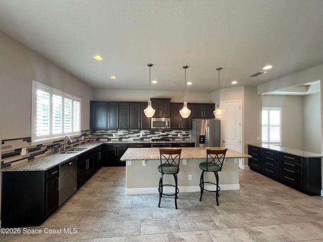 3699 Poseidon Way, Melbourne, FL 32903