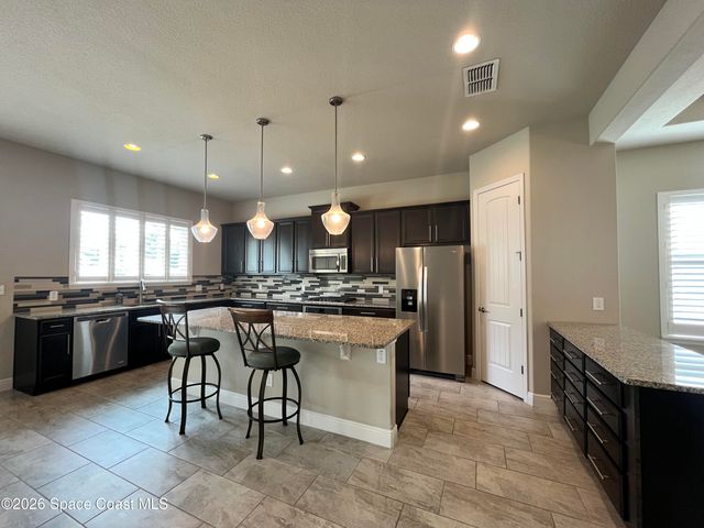 3699 Poseidon Way, Melbourne, FL 32903