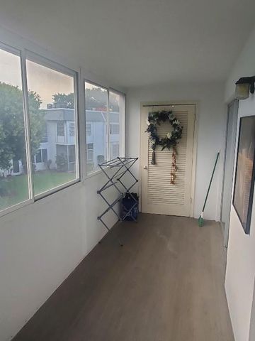 3160 Lake Osborne Drive 201, Lake Worth Beach, FL 33461