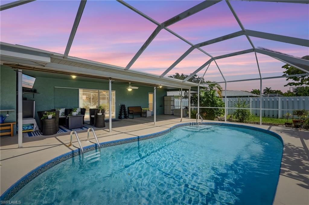 Image 1 of property listing at 329 16th PL, Cape Coral, FL 33990