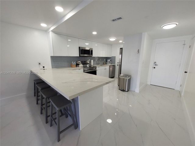 400 Golden Isles Drive 47, Hallandale Beach, FL 33009