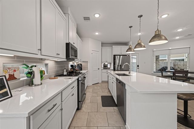 7803 Swooping Swallow Lane, Katy, TX 77493