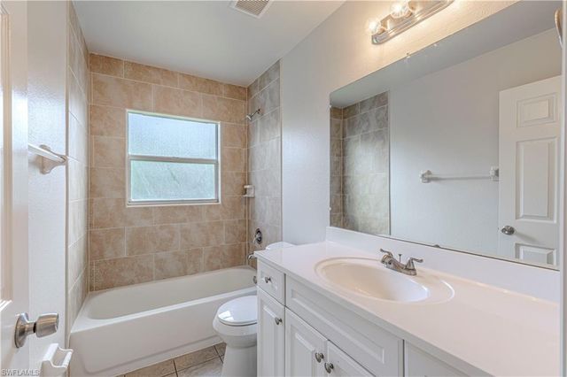 713 Cardinal ST E, Lehigh Acres, FL 33974