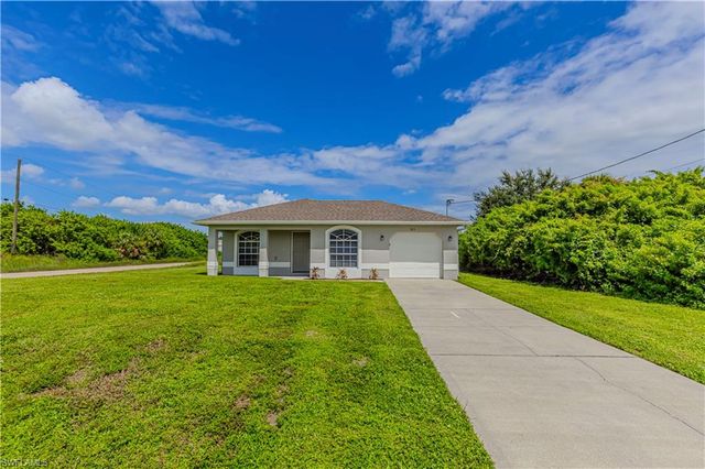 713 Cardinal ST E, Lehigh Acres, FL 33974