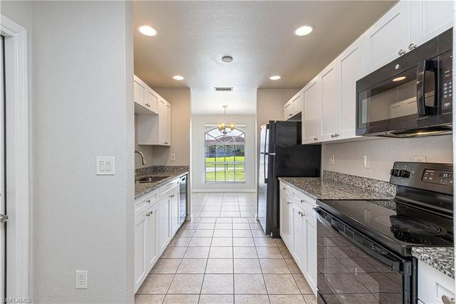 713 Cardinal ST E, Lehigh Acres, FL 33974