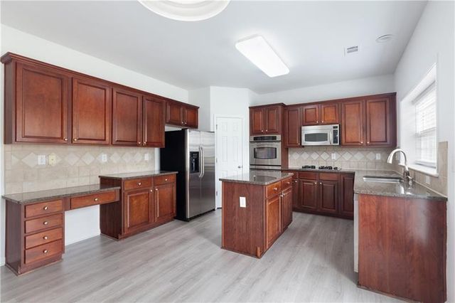 4987 Rustic Canyon Drive, Suwanee, GA 30024