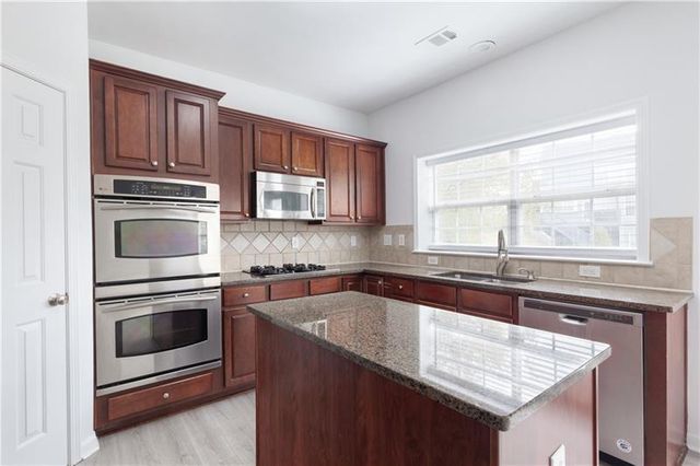 4987 Rustic Canyon Drive, Suwanee, GA 30024