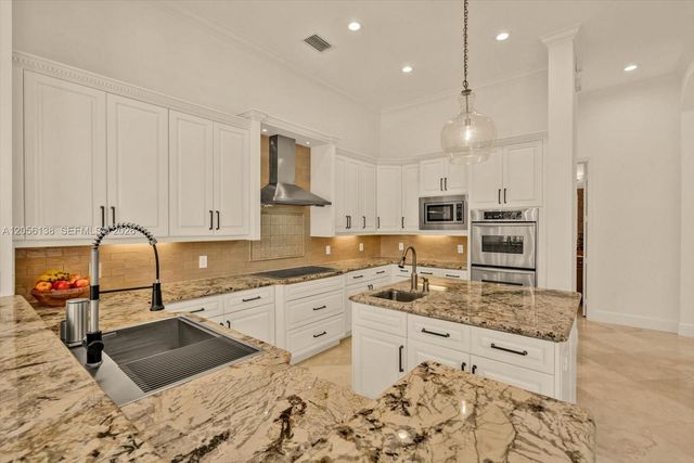 12260 NW 68th Ct, Parkland, FL 33076