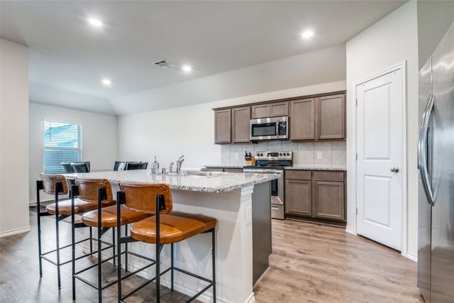 2121 Brisbon Street, Fate, TX 75189