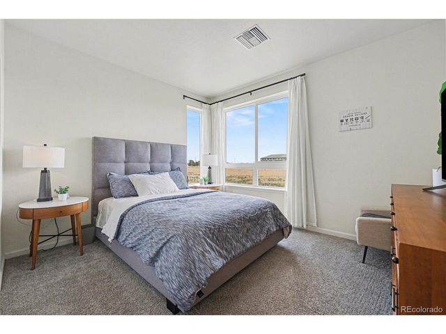 6153 N Ceylon St 7-102, Denver, CO 80249