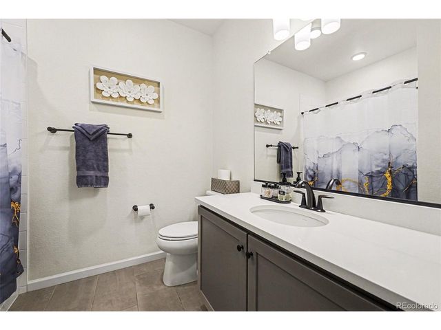 6153 N Ceylon St 7-102, Denver, CO 80249