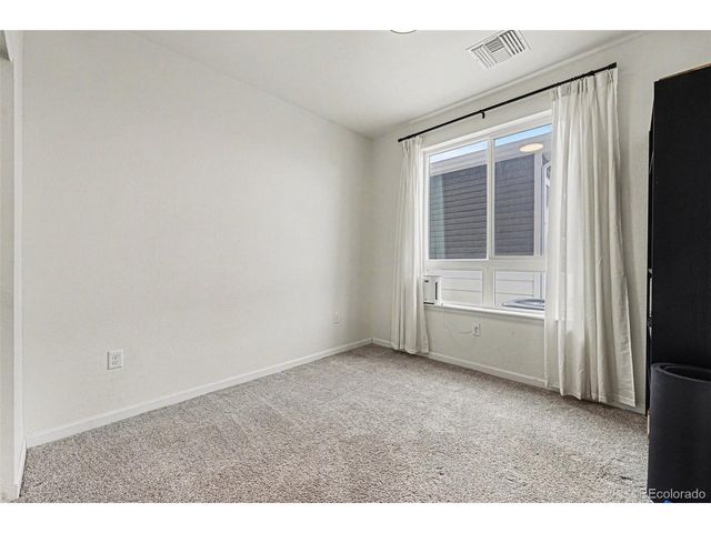 6153 N Ceylon St 7-102, Denver, CO 80249
