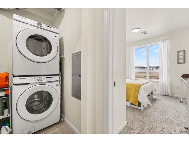 6153 N Ceylon St 7-102, Denver, CO 80249