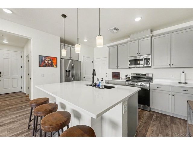 6153 N Ceylon St 7-102, Denver, CO 80249