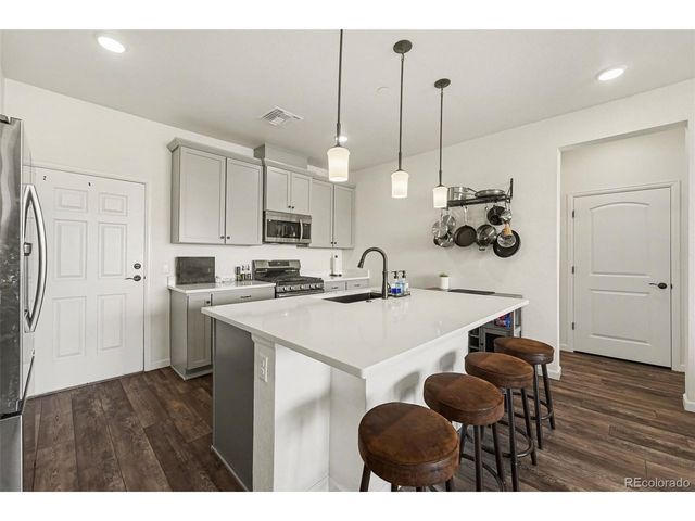 6153 N Ceylon St 7-102, Denver, CO 80249