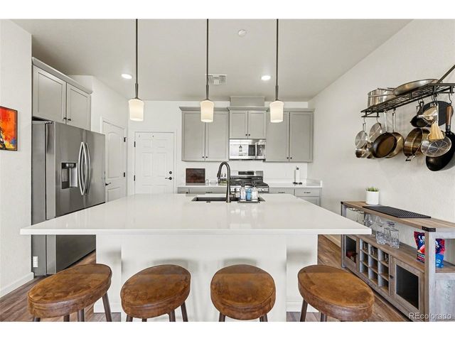 6153 N Ceylon St 7-102, Denver, CO 80249