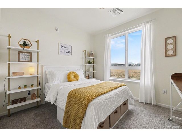 6153 N Ceylon St 7-102, Denver, CO 80249